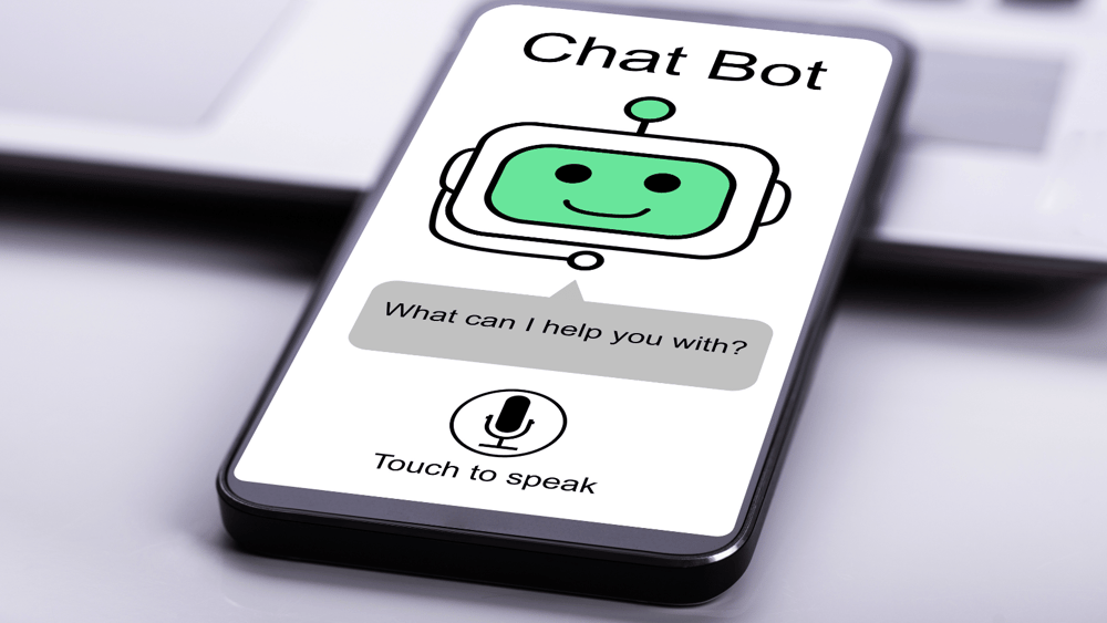 A cell phone shows a depiction of a voice-activated chatbot application for Ascend Adwerks.