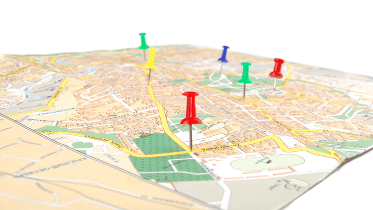 Ascend Adwerks image of a close up of a map with pins on it symbolizing geo-fencing marketing services.