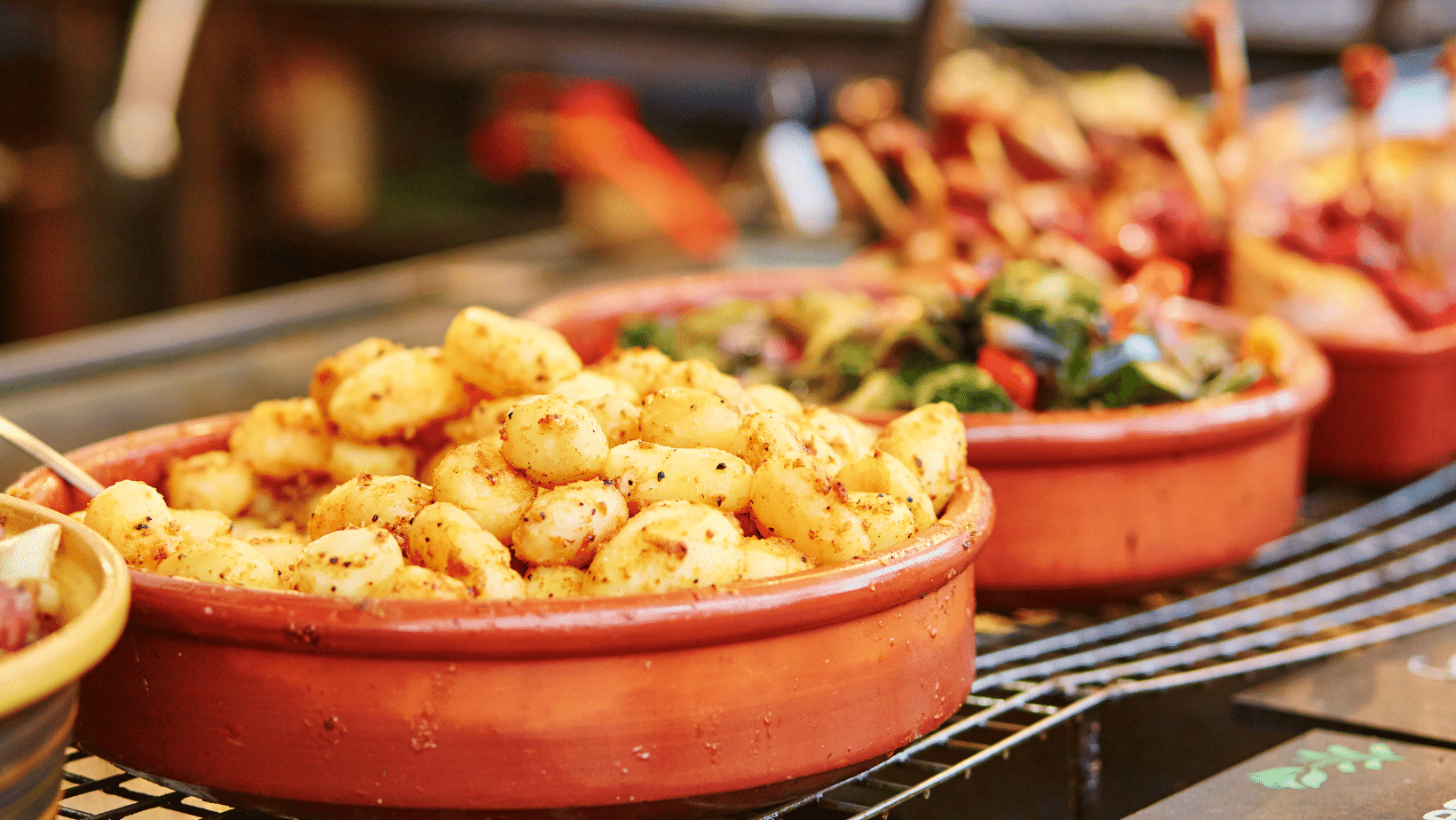 An Ascend Adwerks' image of a bunch of bowls filled with different types of food.