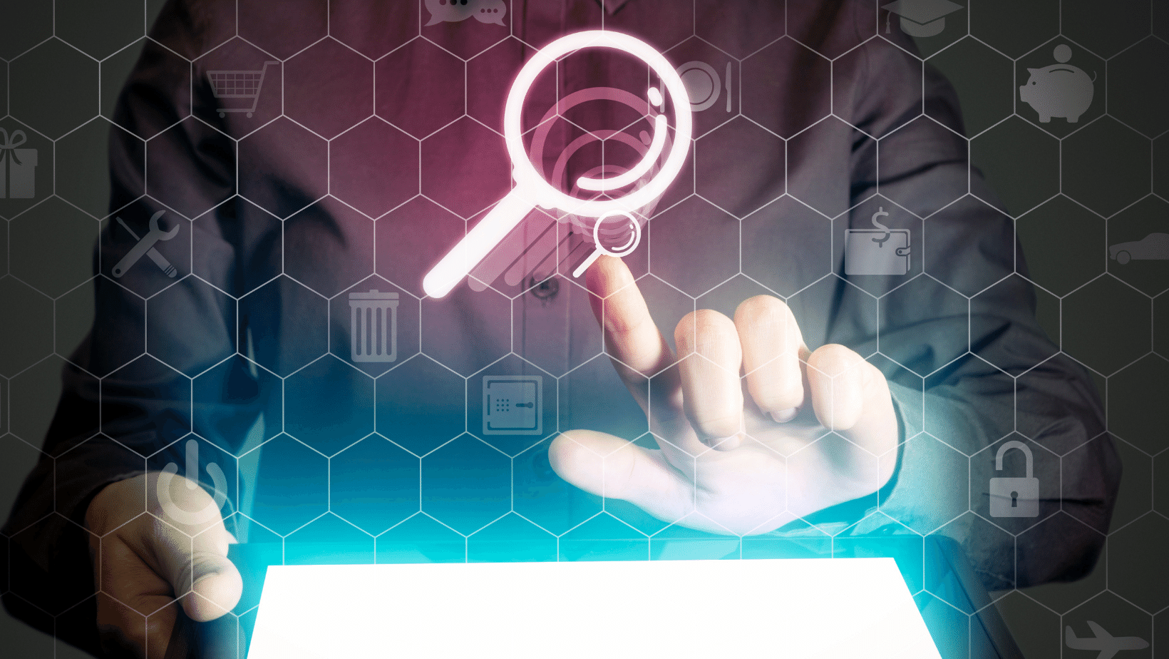 Ascend Adwerks' business person holding a tablet with a magnifying icon on the screen