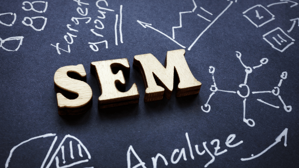 Ascend Adwerks' image with block letters of 'SEM' on top of a chalk board represent SEM services.