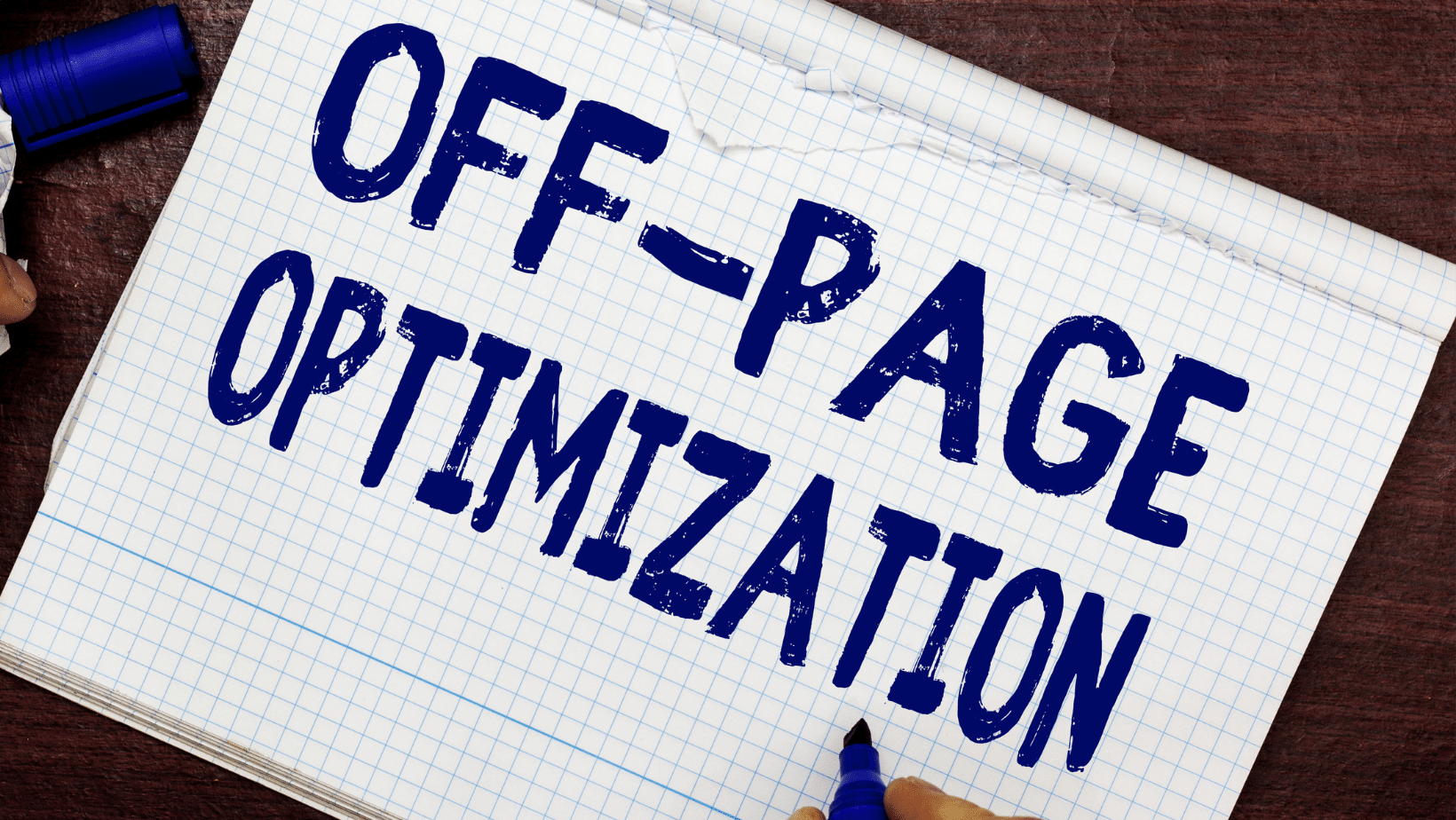 Ascend Adwerks' grid paper with 'off-page optimization' written on it in blue.