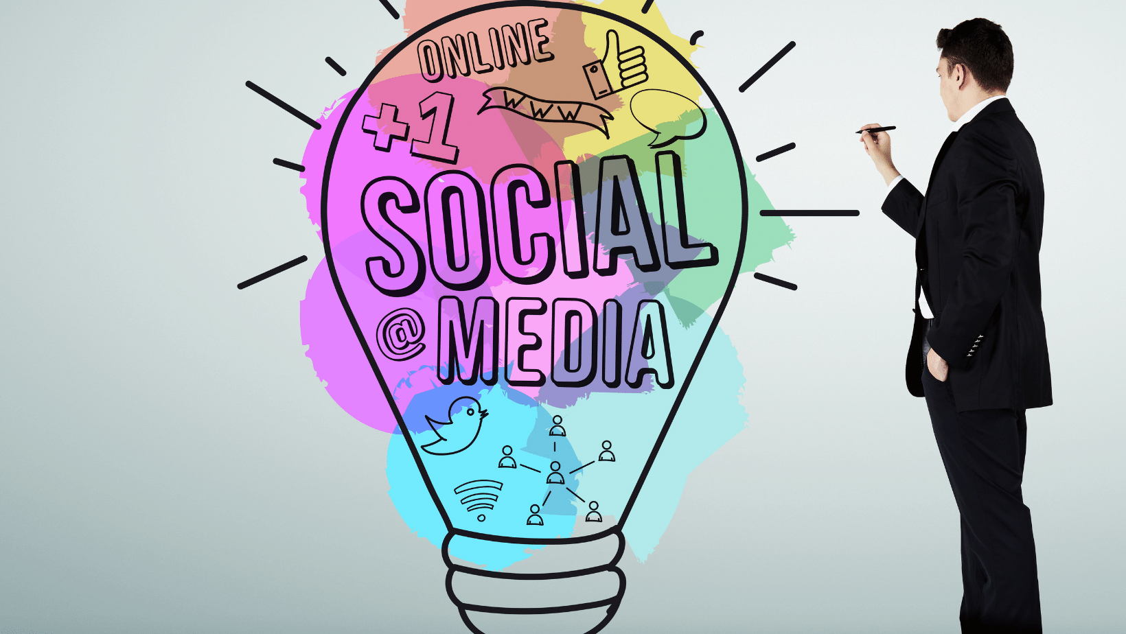 Ascend Adwerks' businessman is drawing social media concept in a lightbulb.