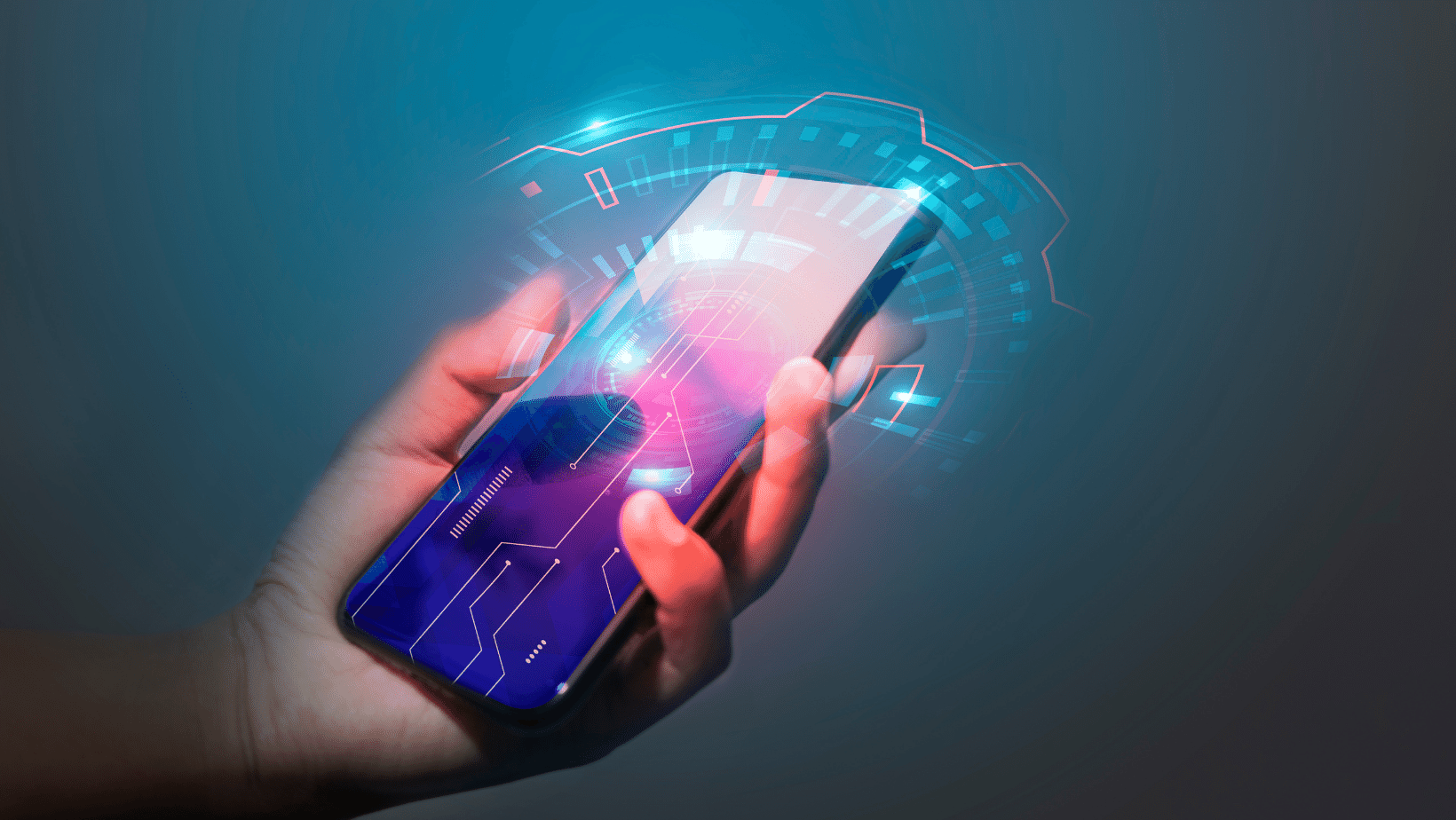 A Ascend Adwerks’ hand holding a smart phone with a futuristic interface on a dark background stock photo